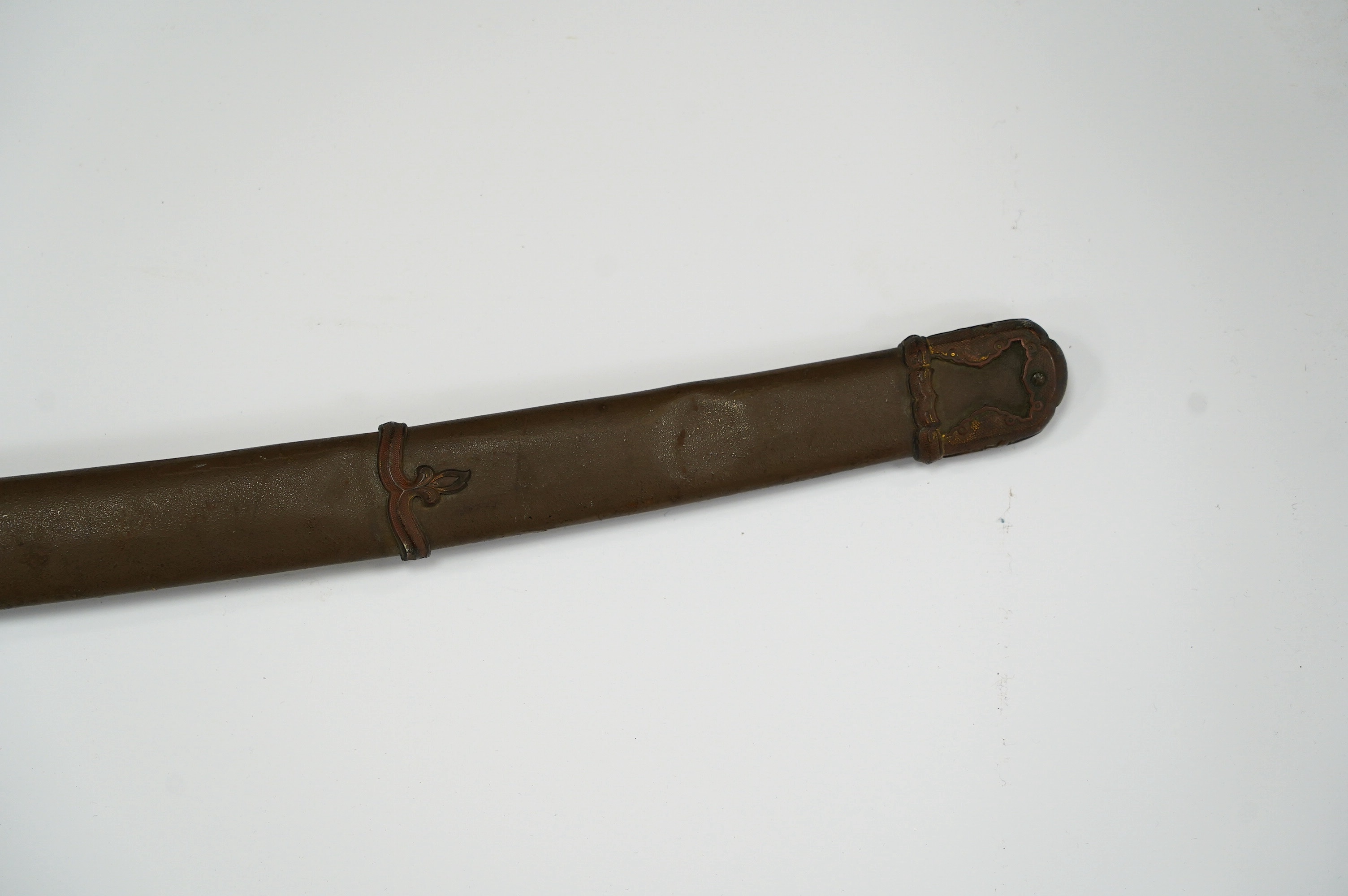 A Japanese WWII army officer’s sword Katana, blade 65cm, signed tang, retaining good polish, in shin gunto mounts. Condition - good